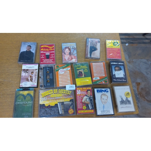 241 - A set of 15 music cassette tapes featuring various artists and genres. Artists include Fergal Flaher... 