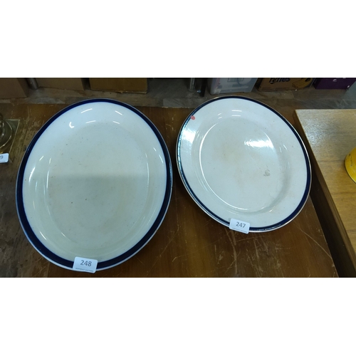 247 - Pair of vintage blue-rimmed porcelain serving platters. Classic design with a white base and blue ed... 