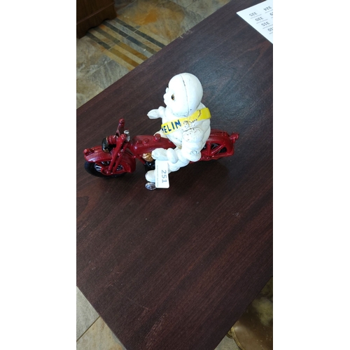 251 - Vintage Michelin Man Mascot on Motorcycle Figurine, painted cast iron. The iconic Bibendum character... 