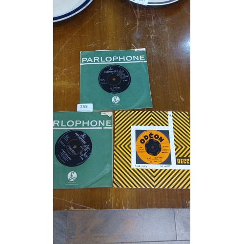 255 - Set of three vintage 45 RPM vinyl records by The Beatles, including 