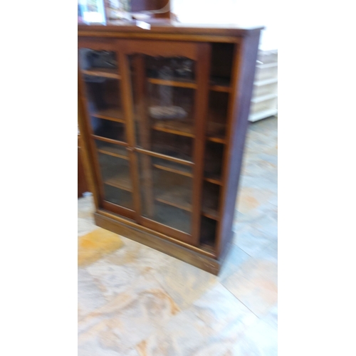260 - Antique wooden display cabinet with glass sliding doors and multiple shelves, likely early to mid 20... 