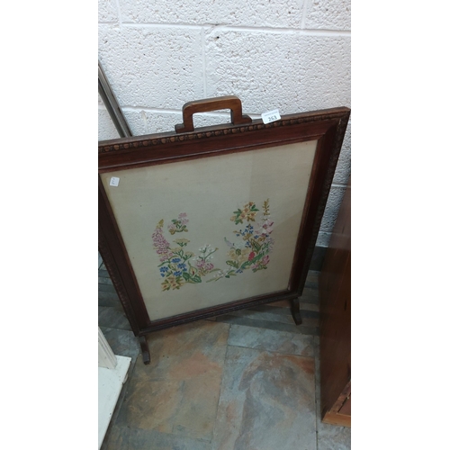 263 - Wooden framed firescreen with hand-embroidered floral design. The product might date back to the Vic... 