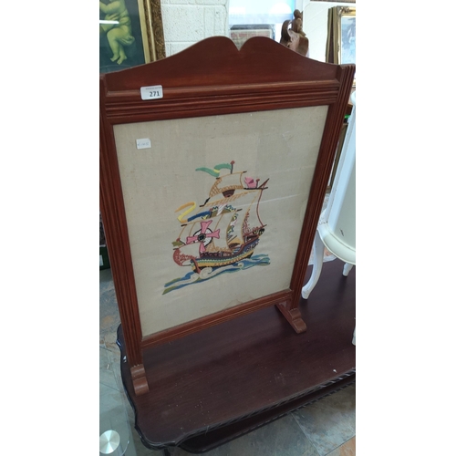 271 - Mahogany firescreen with embroidered ship motif.