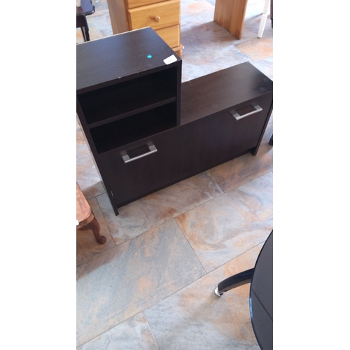 280 - Modern dark wood storage unit with two sections, including open shelving and a drawer. Simple, sleek... 