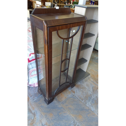282 - Edwardian mahogany display cabinet with glass front and sides, two interior glass shelves and decora... 