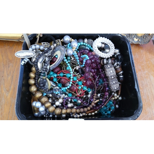 305 - Assortment of costume and beaded jewelry including necklaces, bracelets, and earrings featuring vari... 