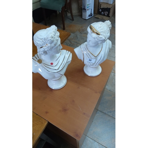 50 - Pair of white ceramic bust sculptures with gold detailing.