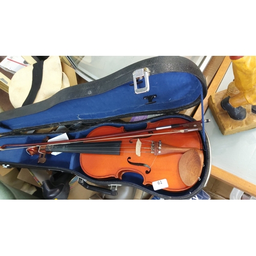 61 - Full-size student violin with bow, housed in a protective hard case with blue interior padding.