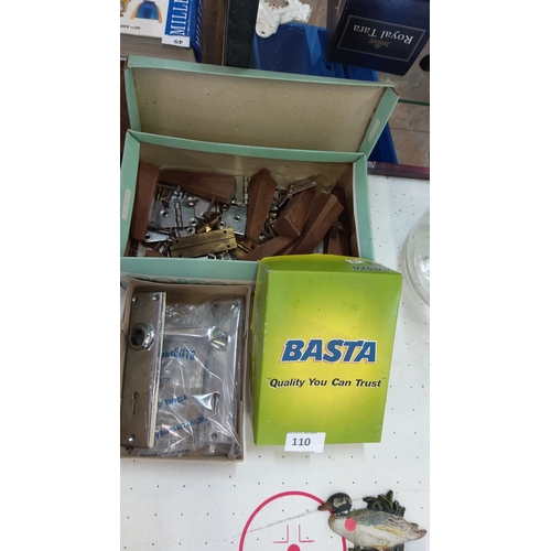 110 - Set of assorted door hardware components, including Basta branded locksets, handles, and various hin... 