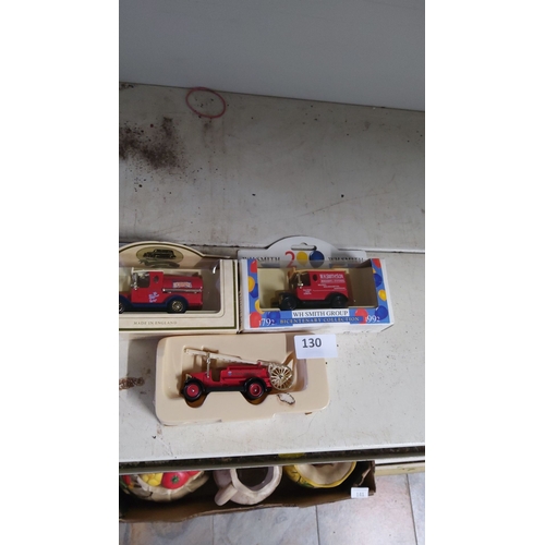 130 - Set of three collectible WH Smith model vehicles includes two boxed vehicles commemorating 200 years... 