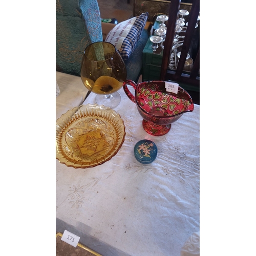 163 - Includes an amber glass stemmed vase, an amber glass bowl with floral design, a hand-painted red gla... 