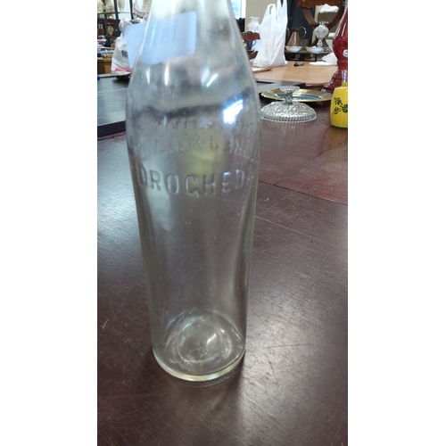 187 - Vintage glass bottle from Luke J Healy Drogheda, with embossed labeling