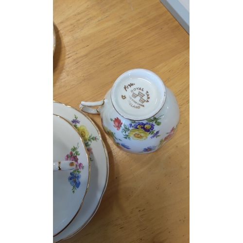 190 - Set of six Royal Tara Fine Bone China trios, floral pattern with gold trim, made in Ireland.