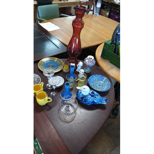 250 - Mixed lot of decorative glass and ceramic items including red glass vase, blue candle holders, glass... 