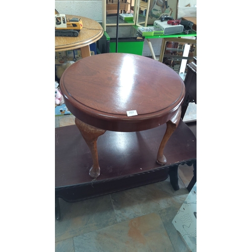 257 - Round wooden side table with a polished finish, featuring traditional Queen Anne-style legs.