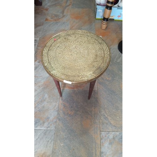 258 - Middle Eastern brass tray table with intricate Arabic inscriptions