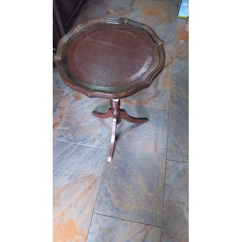 259 - Antique wooden pedestal wine table, featuring a scalloped edged top with leather inlay from the mid-... 