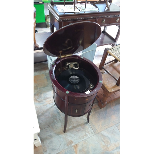 268 - Vintage mahogany wind-up gramophone in a drum-shaped cabinet, from the early 20th century, features ... 