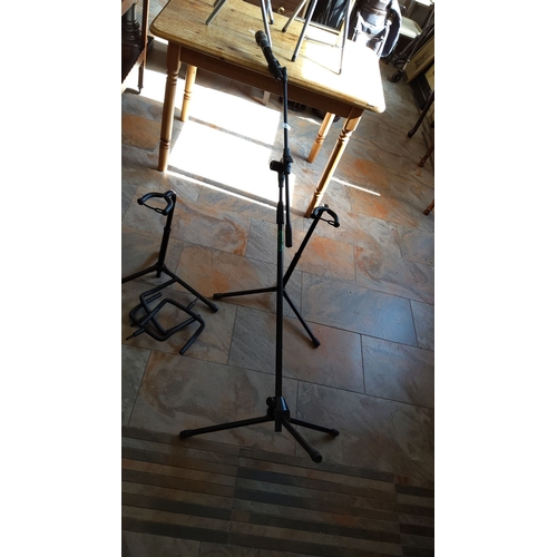 286 - Adjustable microphone stand with folding tripod base,also includes 2 guitar stands