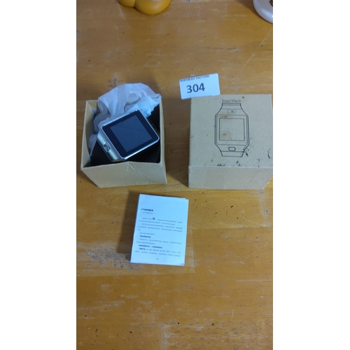 304 - Boxed Smart Watch includes a touchscreen display and original packaging.(needs charger)