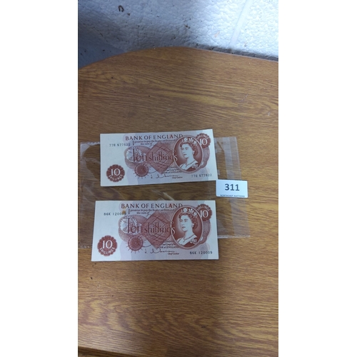 311 - Pair of Bank of England Ten Shillings notes featuring a portrait of Queen Elizabeth II, serial numbe... 