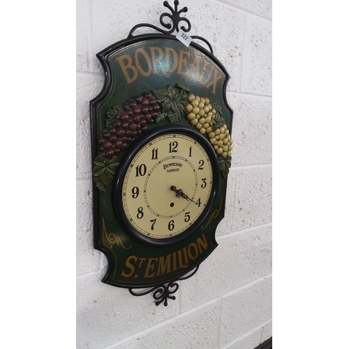 322 - Vintage Dewberry London Bordeaux St. Emilion wall clock, featuring decorative grape motifs and ornat... 