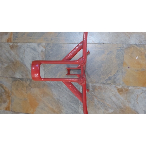 336 - Vintage Red metal bike stand, robust design with a sturdy frame.