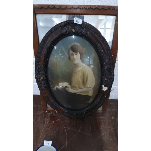 353 - Antique oval portrait photograph in an ornate dark wood frame, featuring a distinguished young woman... 