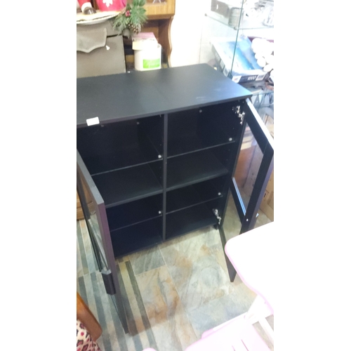 374 - Black wooden cabinet with glass-paneled doors, featuring six internal shelves. Modern design.