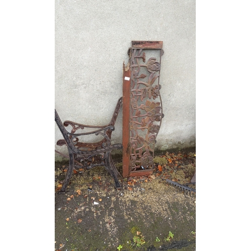 391 - Antique cast iron bench ends and back. Early 20th century design elements.