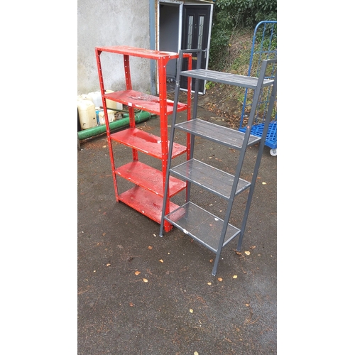 393 - Two metal storage shelves: one red with four tiers and one grey with five tiers.