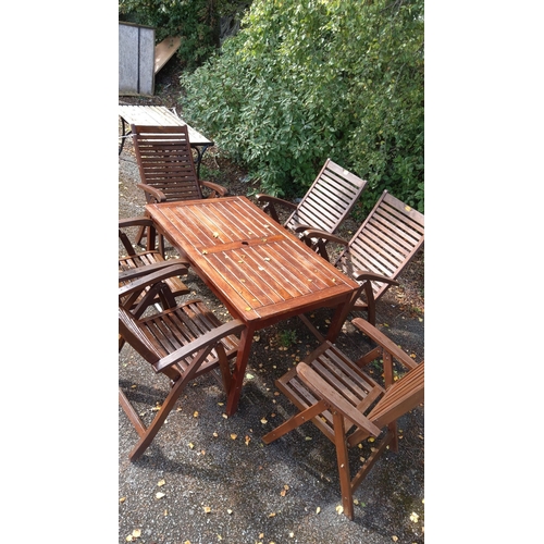 403 - Teak wood garden set includes one rectangular table and 5 matching chairs +1 with a classic slatted ... 