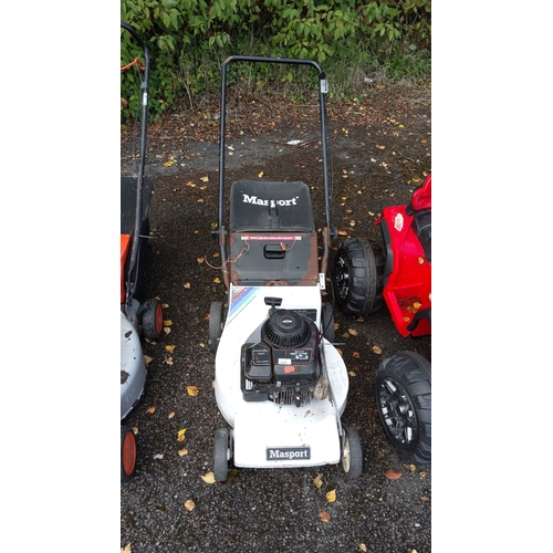 409 - Masport petrol lawn mower with original branding, featuring a Briggs and Stratton engine.(untested)