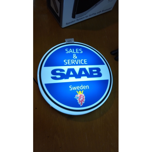 423 - SAAB Sales & Service illuminated round sign. Blue and white with the iconic griffin symbol.