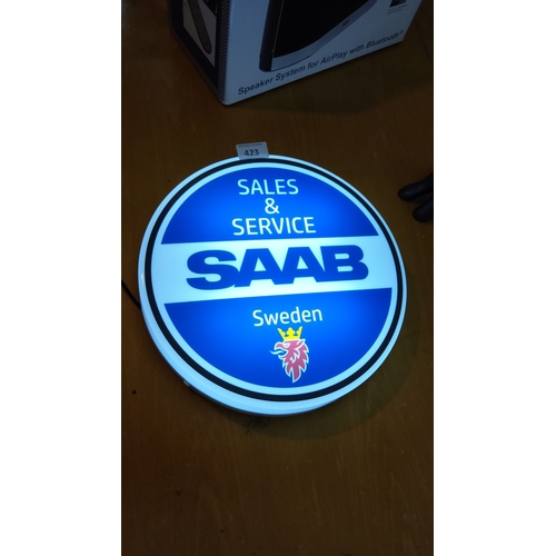 423 - SAAB Sales & Service illuminated round sign. Blue and white with the iconic griffin symbol.