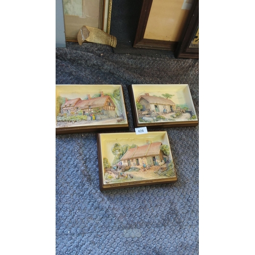 428 - Bossons wall plaques featuring detailed miniature relief scenes. Subjects include 