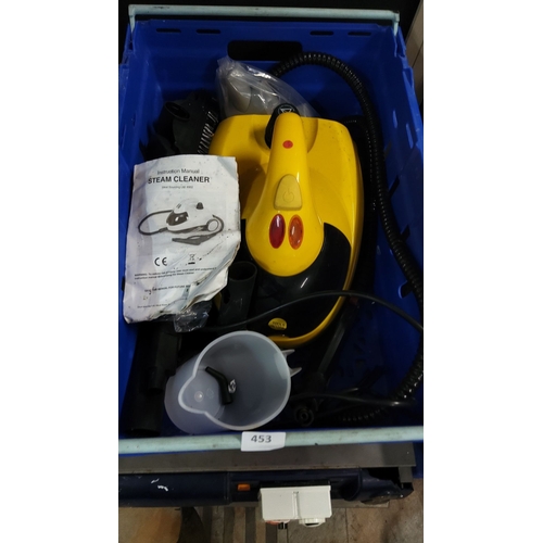 453 - Steam cleaner set includes a yellow and black body, flexible hose attachments, and miscellaneous acc... 