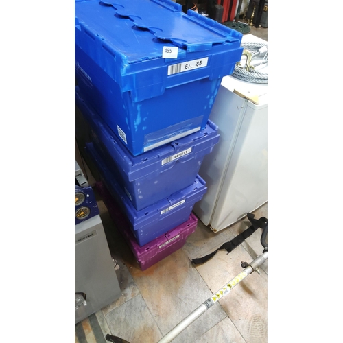 455 - Stack of four plastic storage containers