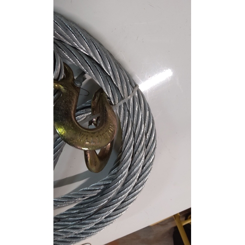 456 - Heavy-duty steel wire rope with attached metal hooks. Approximately 15 feet in length.