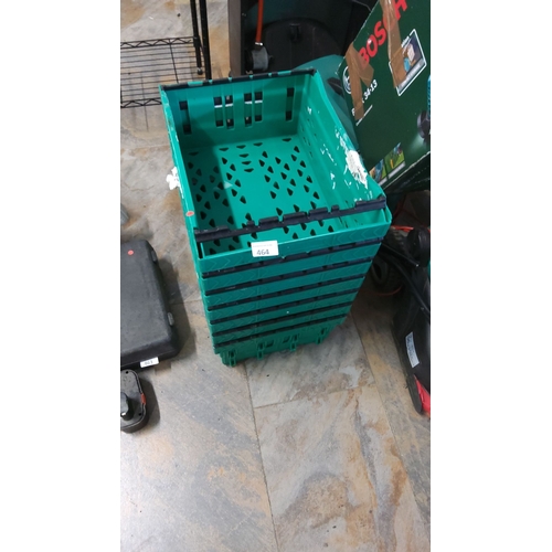 464 - Set of six small green plastic storage crates.