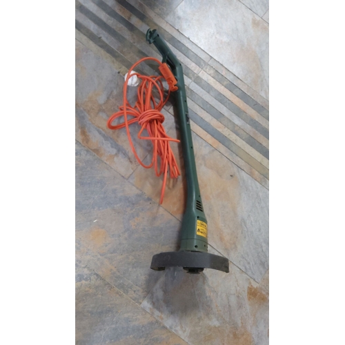 475 - Black & Decker GL320 electric grass trimmer. Made in England. 270W, 240V, and 11500/min. Included wi... 