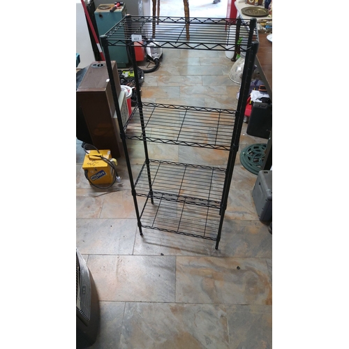 477 - Black wire shelving unit with four shelves.