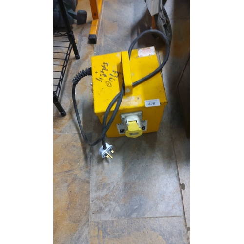 478 - Yellow transformer with multiple power outlets and heavy-duty cable.