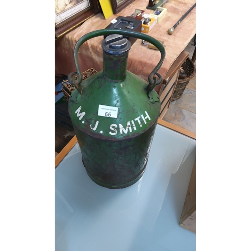 66 - Antique green metal oil can with spout and handle, marked 