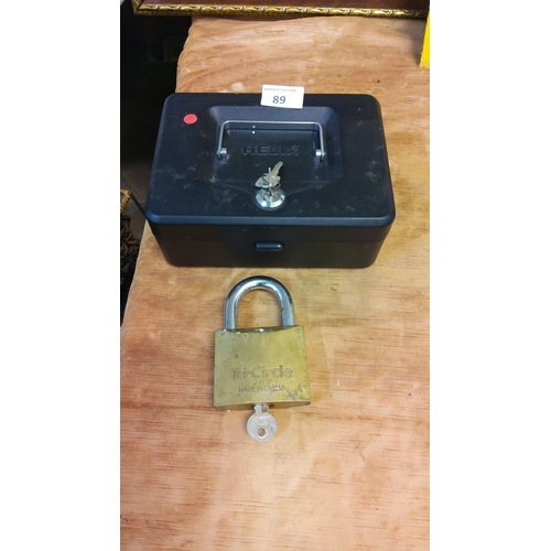 89 - Helix black lockbox with key, accompanied by a Tri-Circle brass padlock with key.