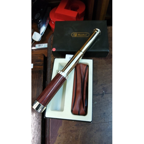 97 - Hunter brand, wooden and chrome extendable telescope, in original box with leather carrying case.