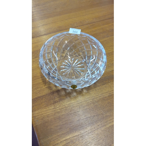 161 - Waterford crystal bowl featuring an intricate diamond-cut pattern and starburst base design.