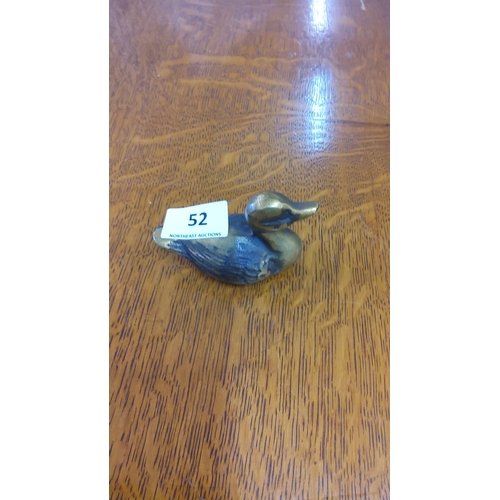 52 - Bronze duck figurine with lifelike details, displaying a patinated and polished finish. Made from so... 