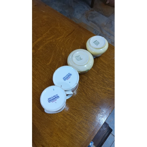 58 - Set of four English bone china pieces: two Elizabethan 