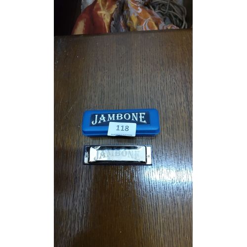 118 - Harmonica in its original blue plastic case, with bold white lettering.